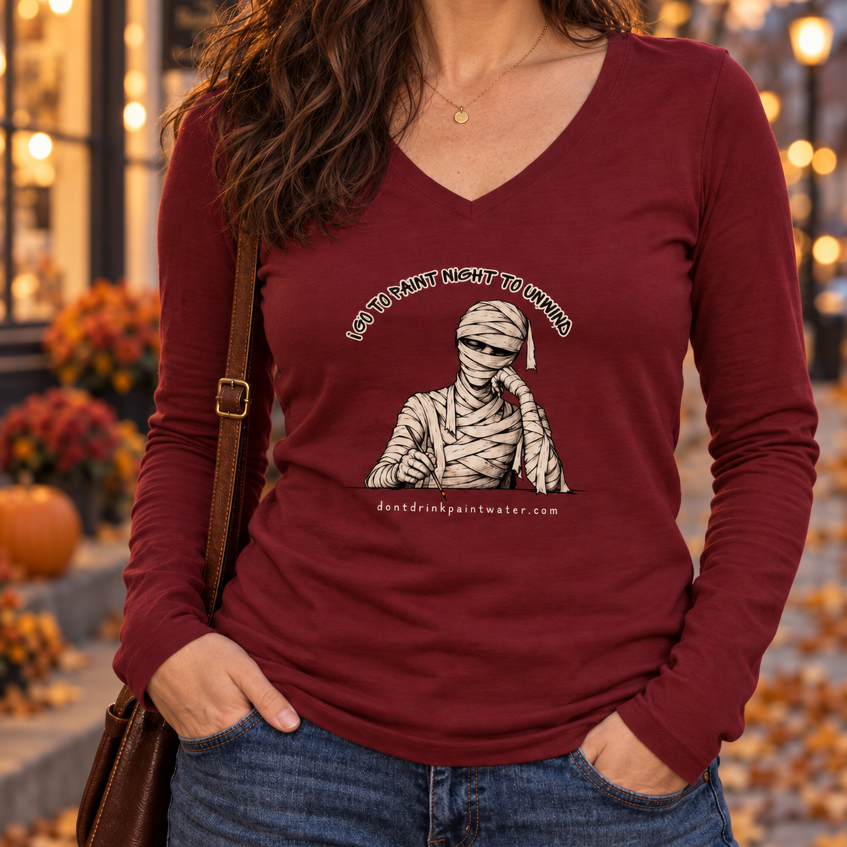 Mummy Graphic V-Neck Tee "I go to paint night to unwind"— Vintage Halloween Long-Sleeve for Women